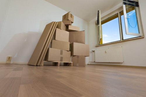 Moving boxes and labels ready for a Holland Park property relocation