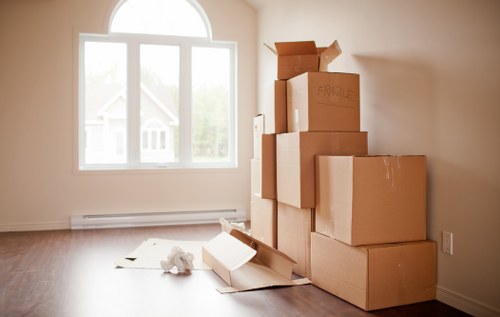 Furniture and boxes being loaded for a move in Holland Park