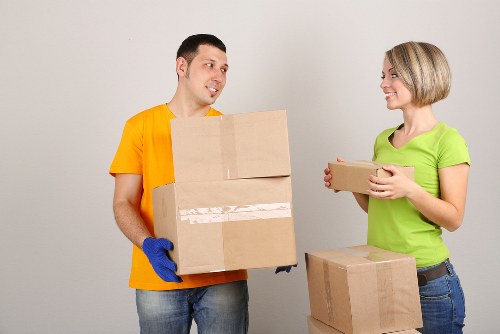 Removal crew managing a home or office relocation near Holland Park