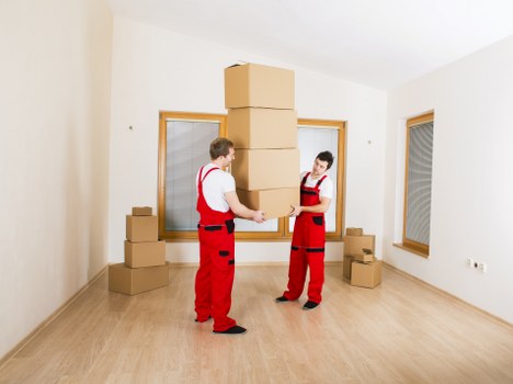 Loading commercial office items for transport in Holland Park